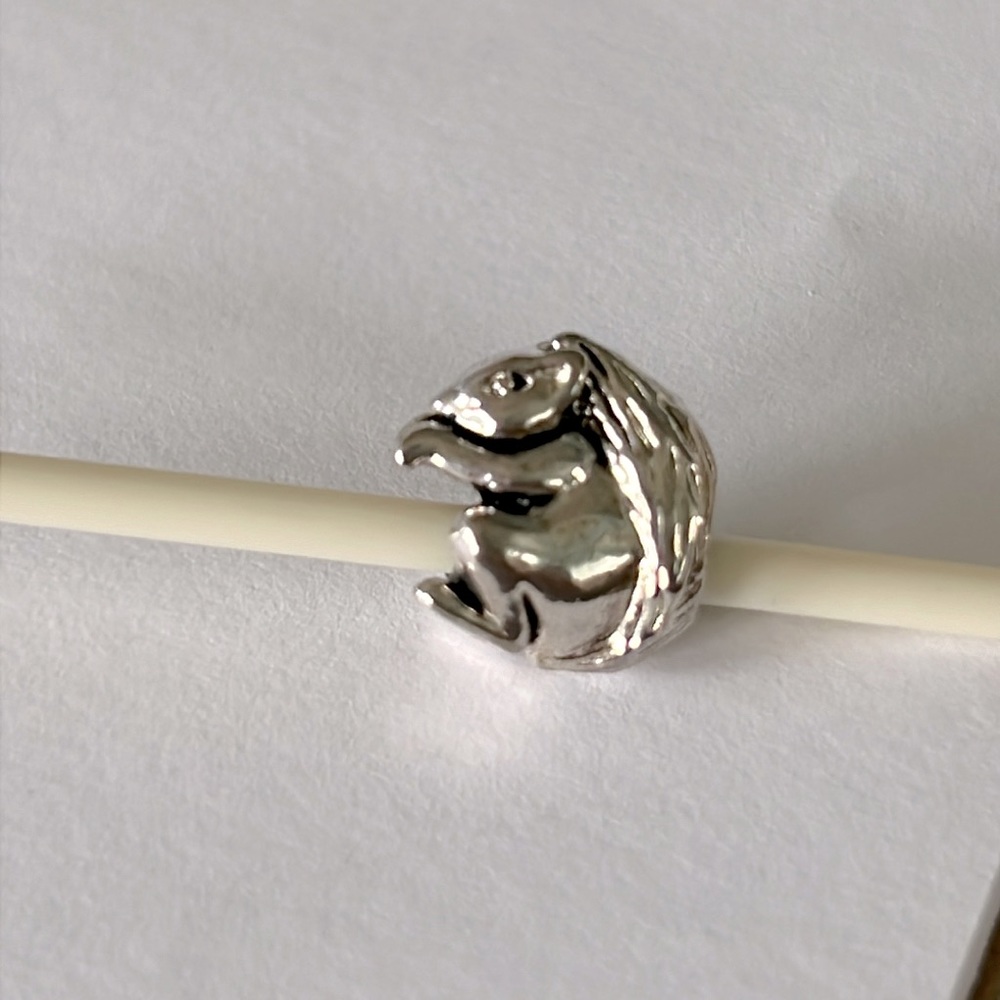 Sterling silver squirrel bead marked 925 on its foot